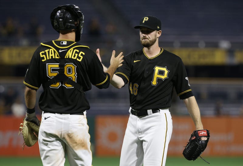 Chris Stratton about to shake hands with Jacob Stallings
