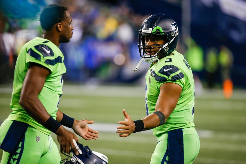 Geno Smith, Russell Wilson