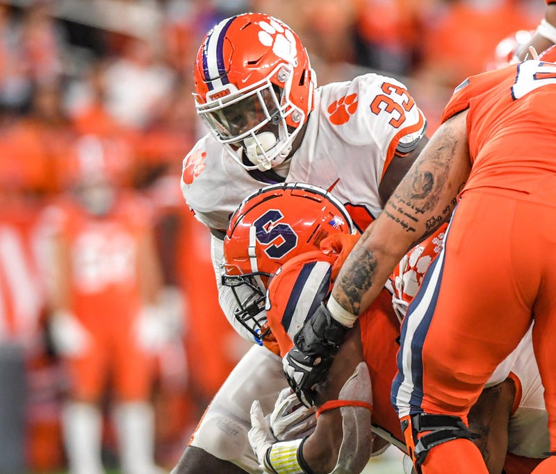 Clemson escapes after kick goes wide left