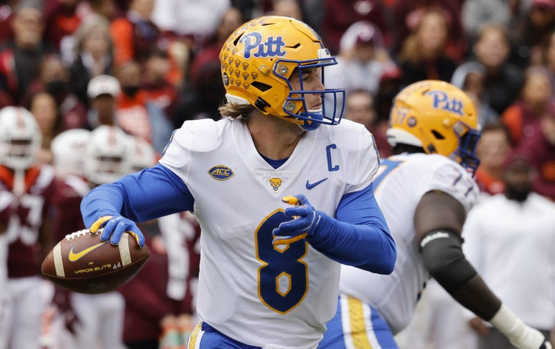 Pittsburgh Panthers quarterback Kenny Pickett (8) drops to throw a pass