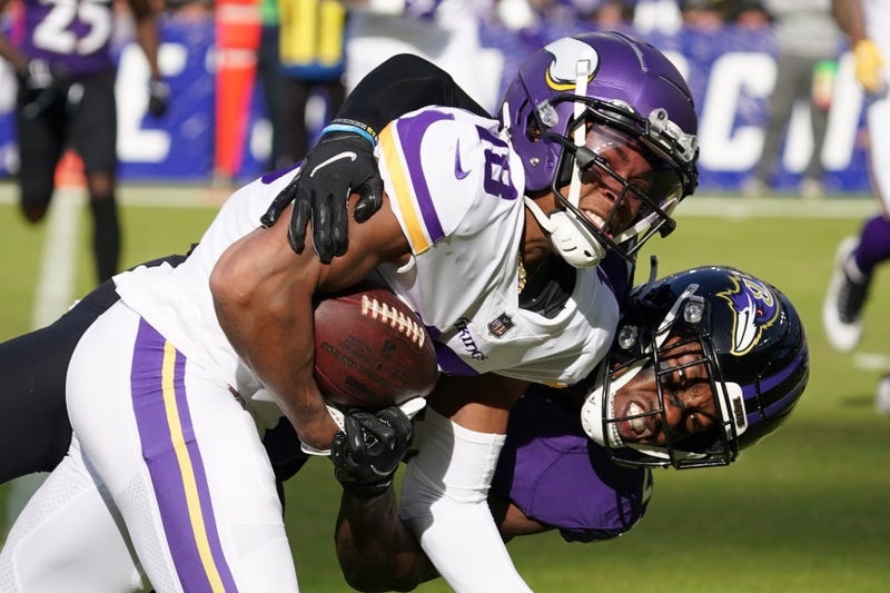 Justin Jefferson (18) tackled in the second quarter by Baltimore Ravens tackle Cedric Ogbuehi (67)