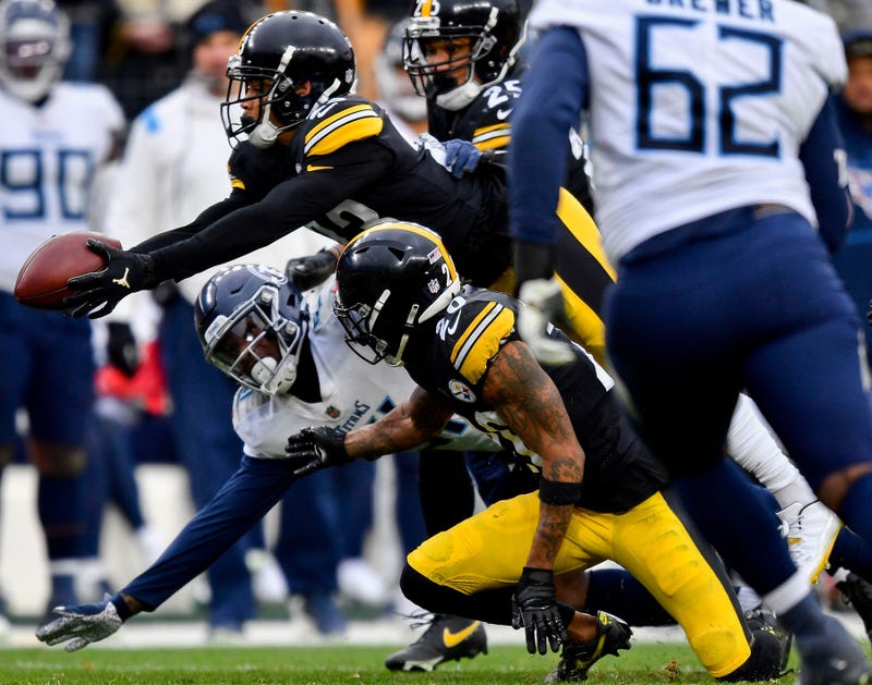 Joe Haden makes an interception against the Titans
