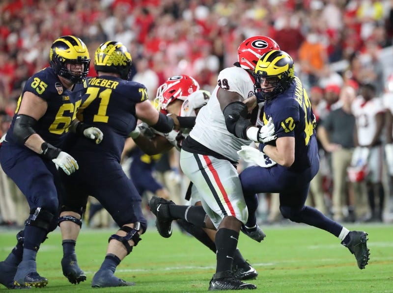 "Alpha Dawgs" Georgia rolls Michigan