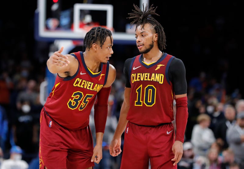 Jan 15, 2022; Oklahoma City, Oklahoma, USA; Cleveland Cavaliers forward Isaac Okoro (35) talks with guard Darius Garland (10) during a break in play against the Oklahoma City Thunder during the second half at Paycom Center.