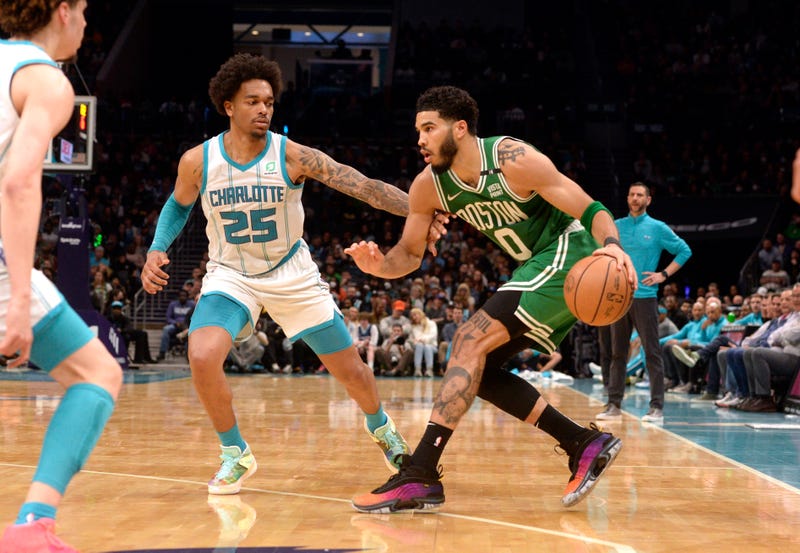 Jayson Tatum tries to find an opening vs. the Hornets