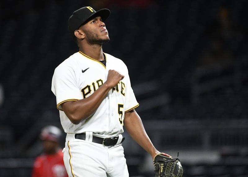 Pittsburgh Pirates pitcher Roansy Contreras (59) reacts after striking out a batter to end the eighth inning