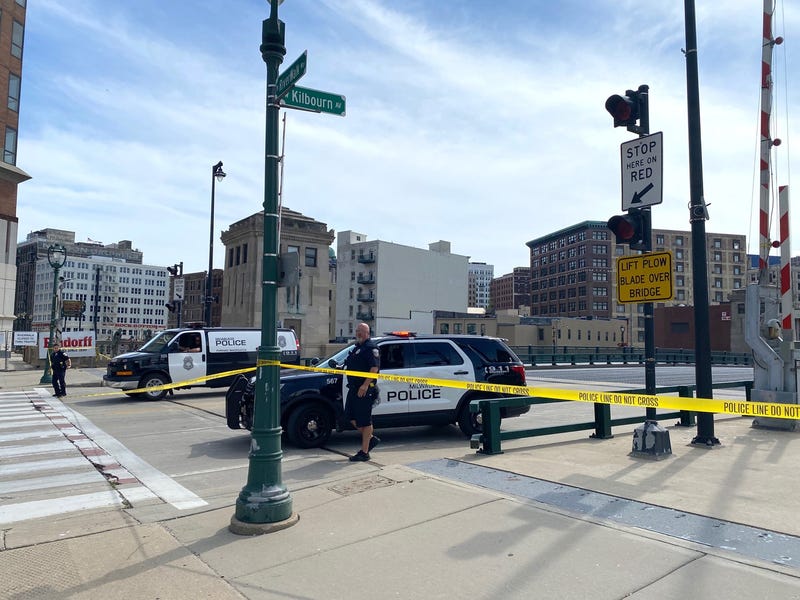 Police officers close off access to the Kilbourn Avenue Bridge after a 77-year-old man died as the bridge was being raised on Monday August 15, 2022.