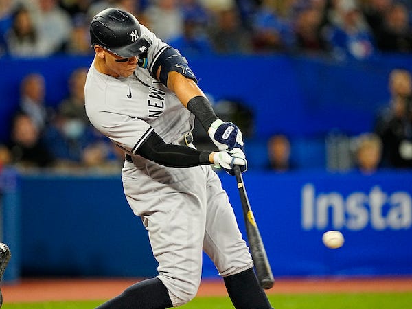New York Yankees right fielder Aaron Judge (99) singles against the Toronto Blue Jays