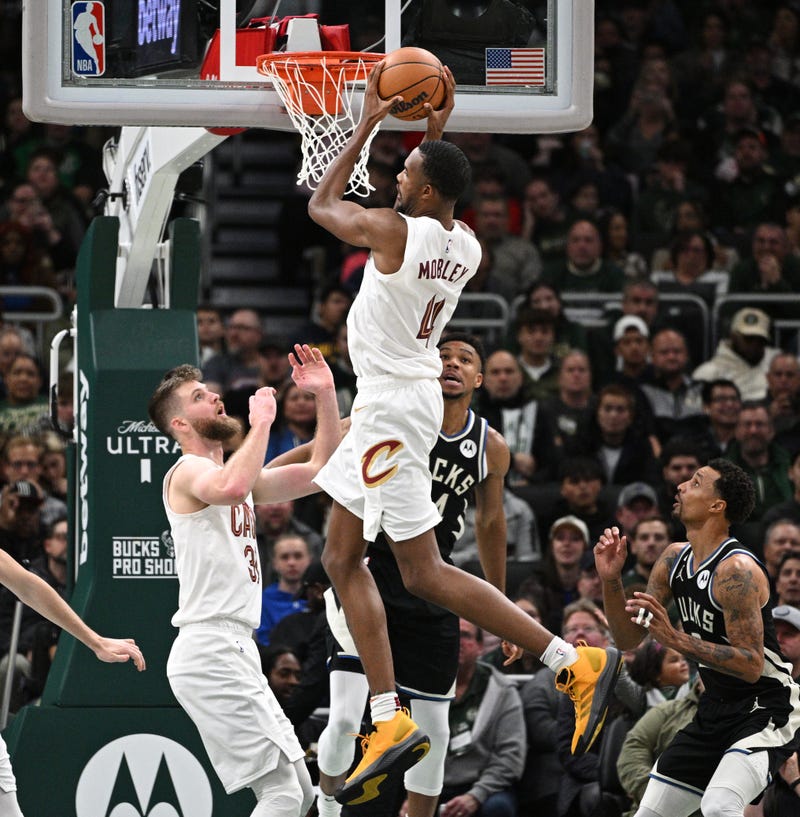 Cleveland Cavaliers forward Evan Mobley (4) pulls down a rebound against Milwaukee Bucks forward Giannis Antetokounmpo (34) in the second half at Fiserv Forum.
