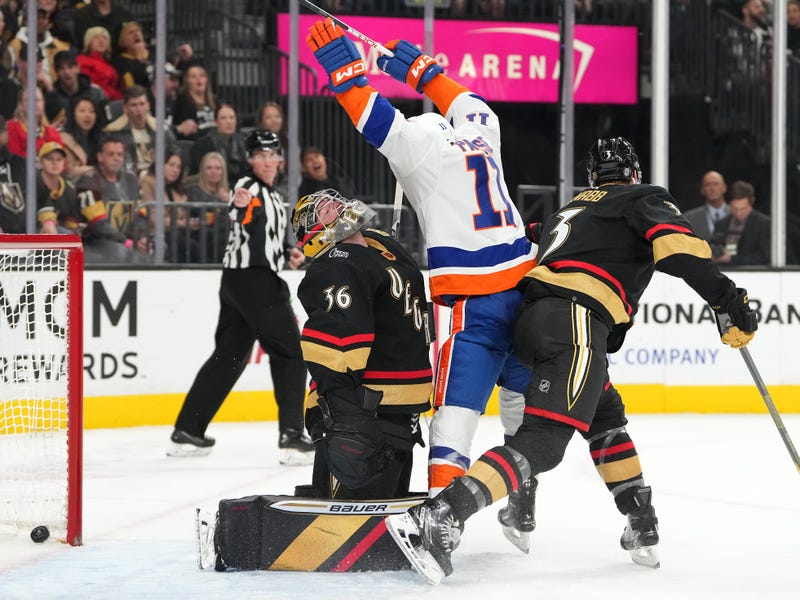 New York Islanders left wing Zach Parise (11) and Vegas Golden Knights goaltender Logan Thompson (36) react after a goal by New York right wing Simon Holmstrom (10) during the second period at T-Mobile Arena.
