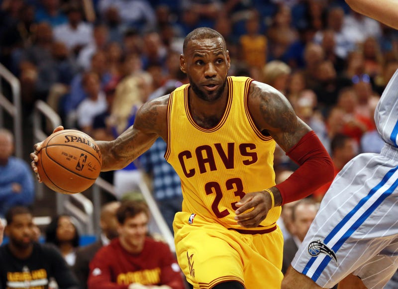 Cleveland Cavaliers forward LeBron James (23) drives to the basket against the Orlando Magic