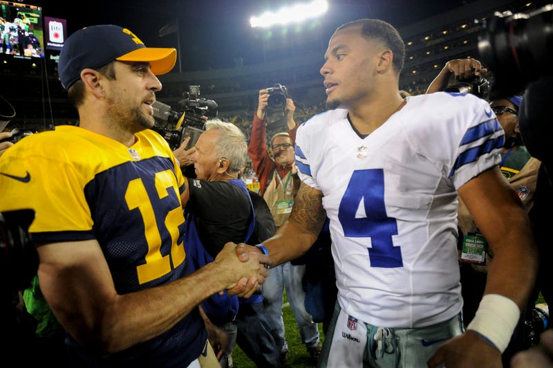 Aaron Rodgers (left) and Dak Prescott (right) will square off in Dallas Sunday.