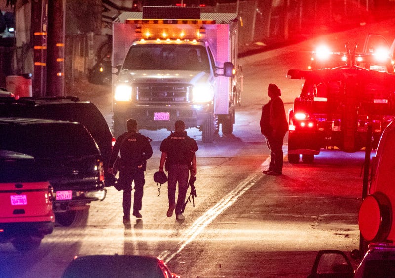Law enforcement officers from multiple agencies continue to investigate the scene on Monday, July 29, 2019 where four people were killed and another 15 injured during the Gilroy Garlic Festival.