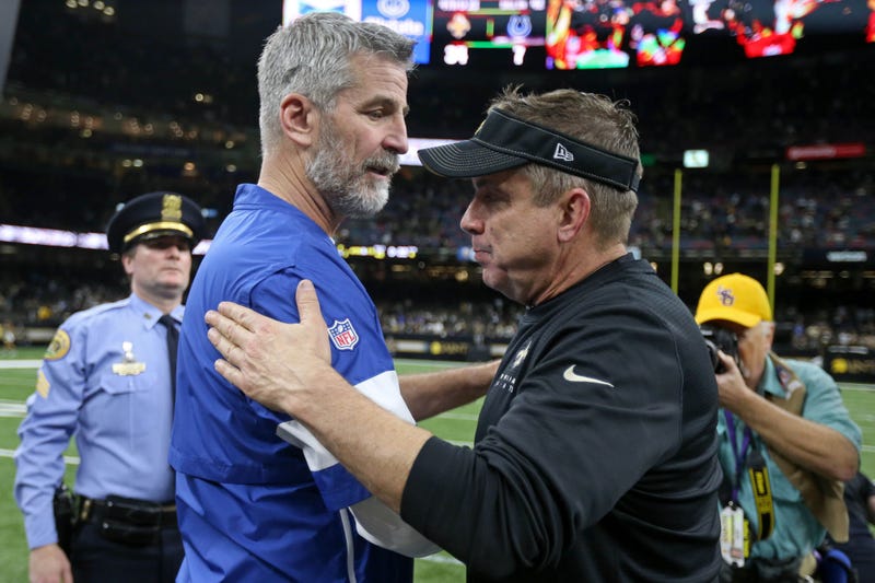 Indianapolis Colts head coach Frank Reich talks to New Orleans Saints head coach Sean Payton after their game at the Mercedes-Benz Superdome