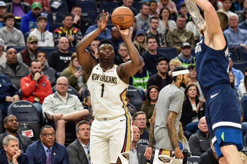  New Orleans Pelicans forward Zion Williamson (1) shoots the ball as Minnesota Timberwolves guard Jaylen Nowell (4) defends during the second quarter at Target Center. 