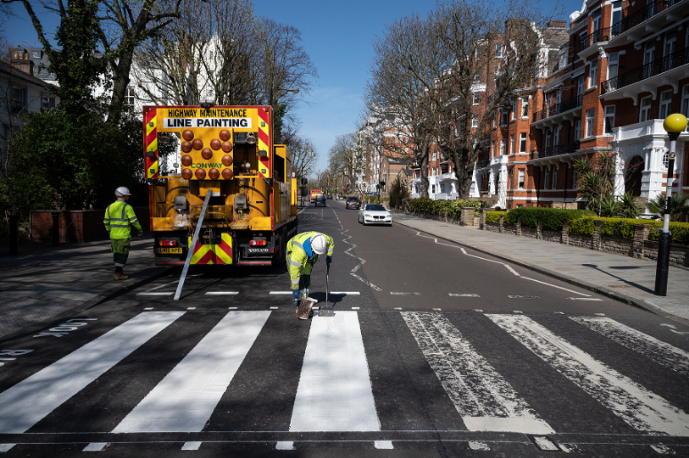 A Highways Maintenance team takes advantage of the COVID-19 coronavirus lockdown and quiet streets to re-paint the iconic Abbey Road crossing on March 24, 2020 in London, England.