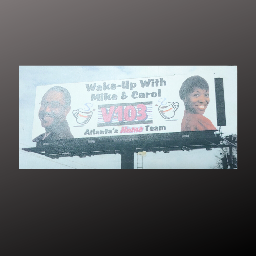 Vintage billboard sign of Mike & Carol in the Mornings on V-103 in the early 90's.