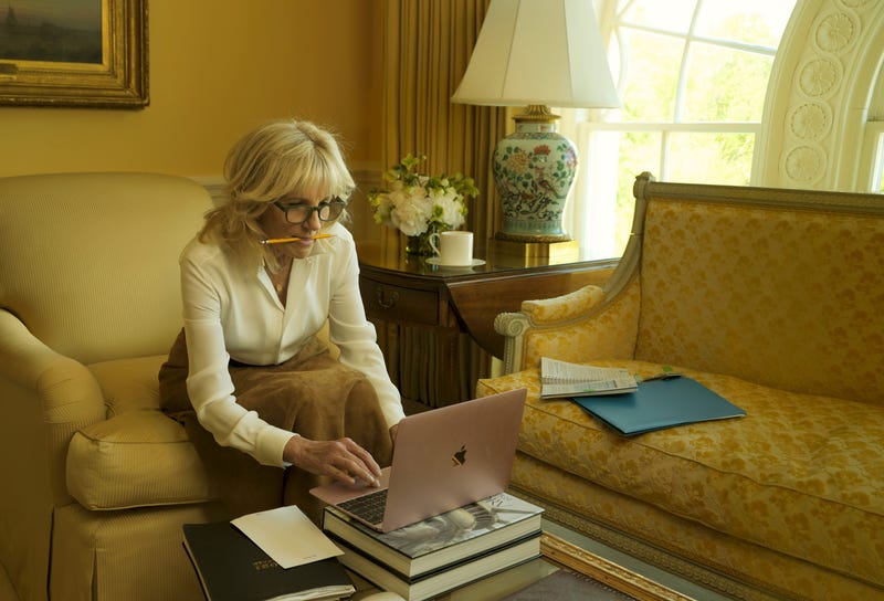 Dr. Biden, in a Ralph Lauren blouse and skirt, in the East Sitting Hall of the White House. Fashion Editor: Tonne Goodman