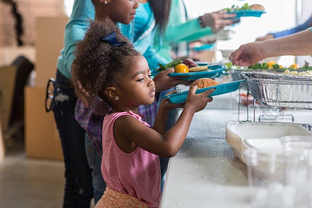 A Child Receives Nutritious Meals Thanks To Weekend Backpacks