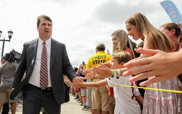 Will Muschamp greeting fans.