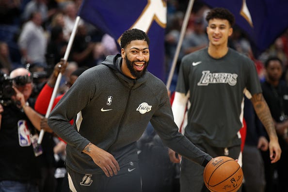 Anthony Davis laughs during warmups with Lakers.