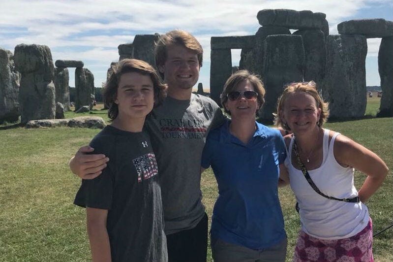 Alicia Terrizzi and Loreen Bloodgood are shown at Stonehenge with their two sons.