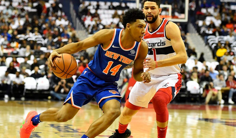 Nov 4, 2018; Washington, DC, USA; New York Knicks guard Allonzo Trier (14) dribbles past Washington Wizards guard Austin Rivers (1) during the first half at Capital One Arena. Mandatory Credit: Brad Mills-USA TODAY Sports
