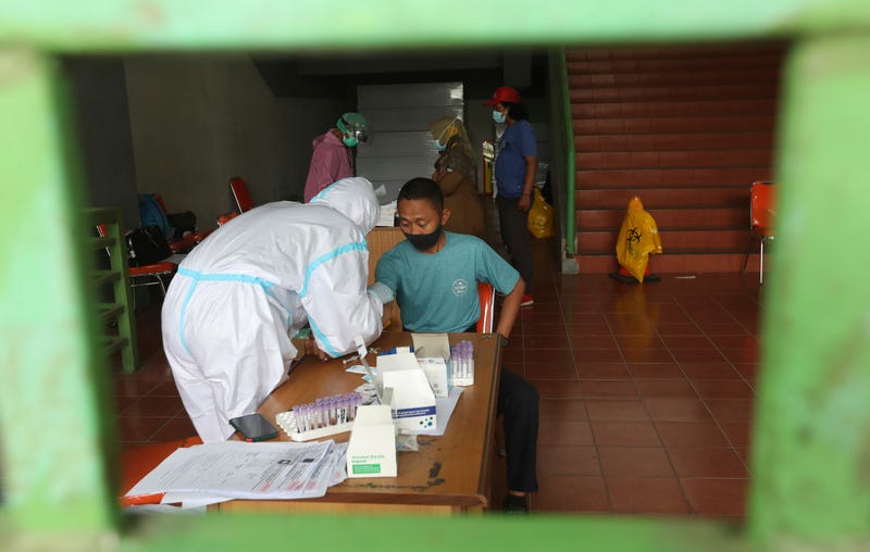 APTOPIX Virus Outbreak Indonesia