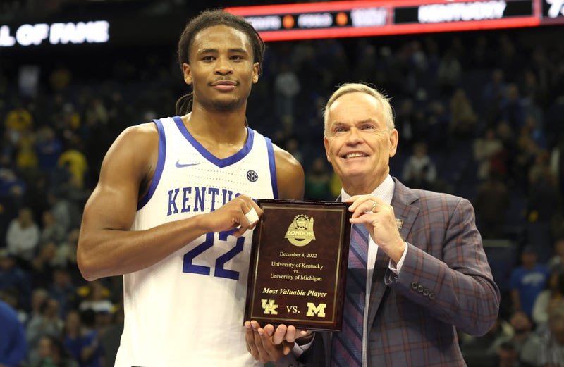Britain Basketball Michigan Kentucky