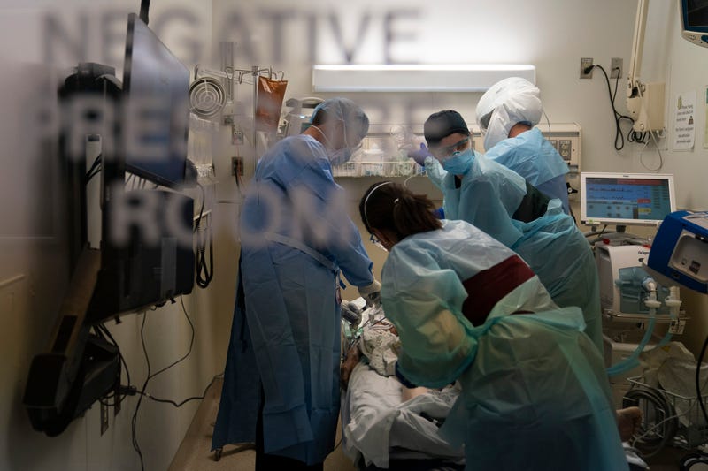 Virus Outbreak US Surge