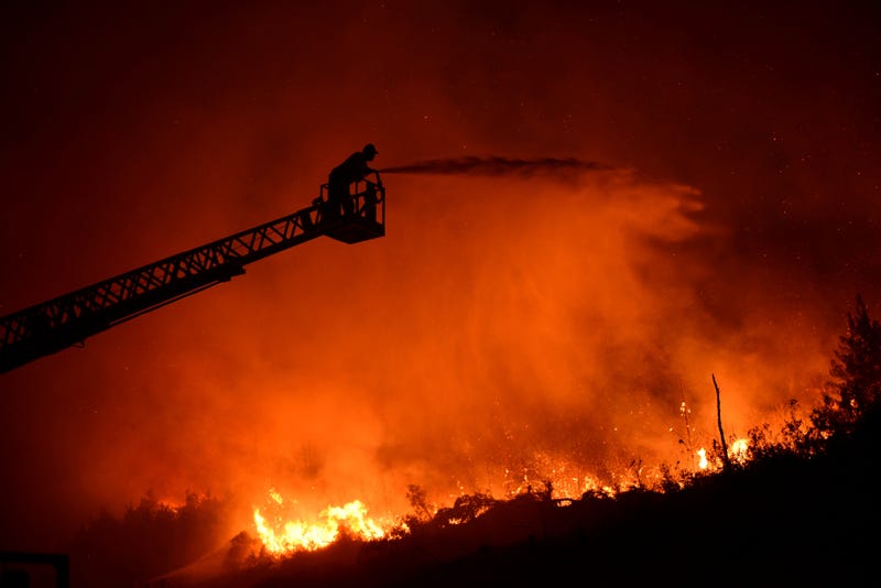 APTOPIX Cyprus Israel Fire