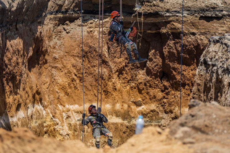APTOPIX Guatemala Sinkhole