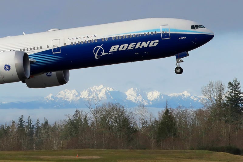 Earns Boeing