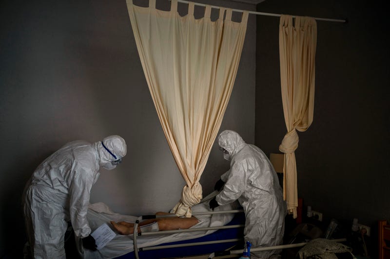 Virus Outbreak Spain's Body Collectors