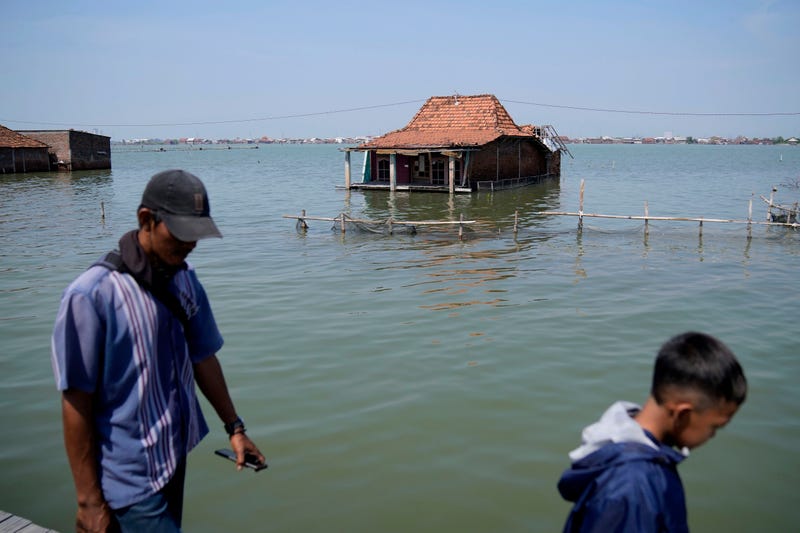 APTOPIX Climate Migration Indonesia