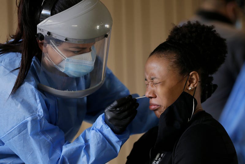 Virus Outbreak US Surge