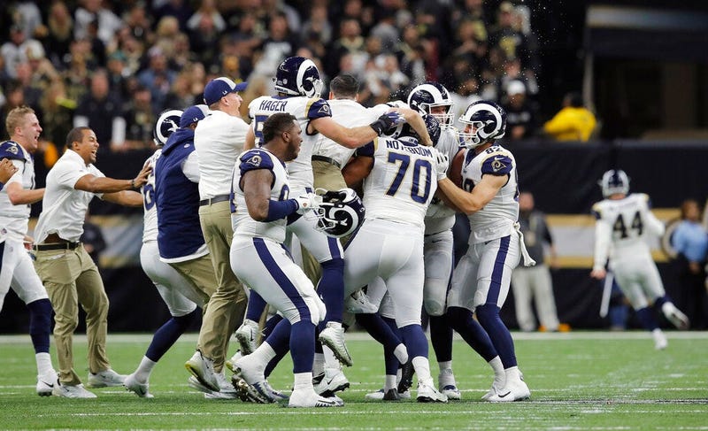 Los Angeles Rams celebrate after overtime of the NFL football NFC championship game against the New Orleans Saints