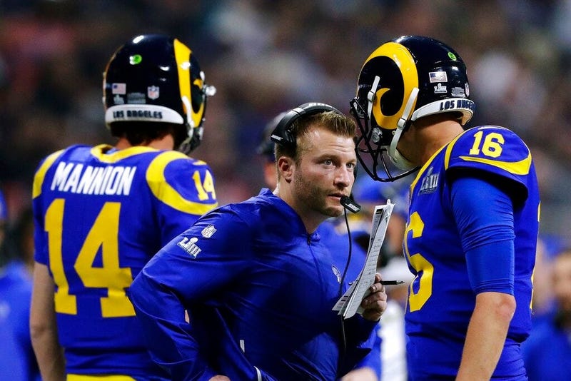 Los Angeles Rams head coach Sean McVay, center, speaks to Jared Goff (16) on the sideline during the second half of the NFL Super Bowl 53 football game against the New England Patriots, Sunday, Feb. 3, 2019, in Atlanta