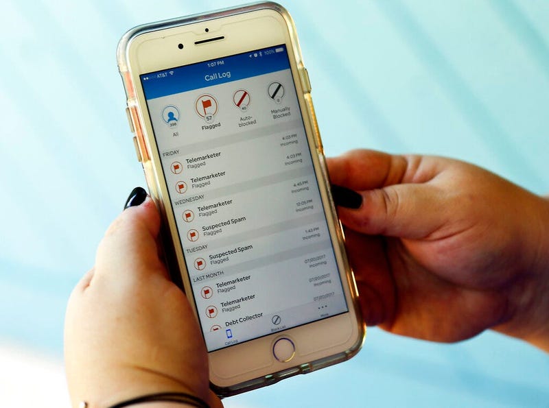 shows a call log displayed via an AT&T app on a cellphone in Orlando