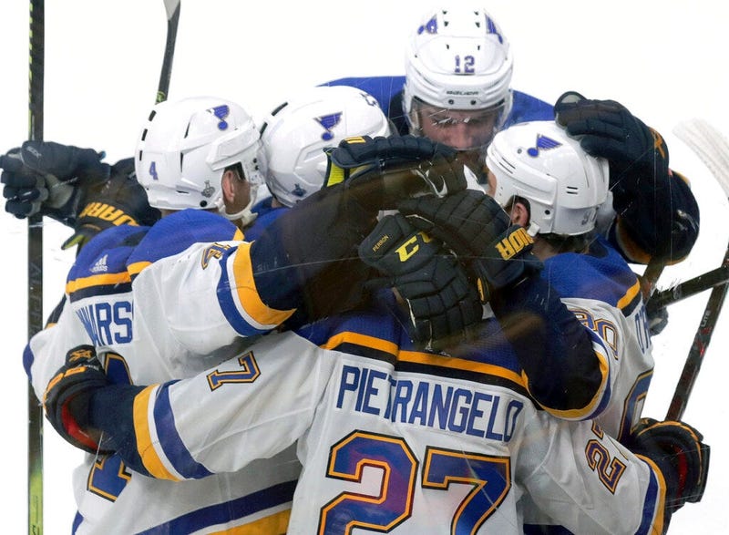 St. Louis Blues' Ryan O'Reilly, right, celebrates his goal against the Boston Bruins with teammates during the second period in Game 5 of the NHL hockey Stanley Cup Final, Thursday, June 6, 2019, in Boston.