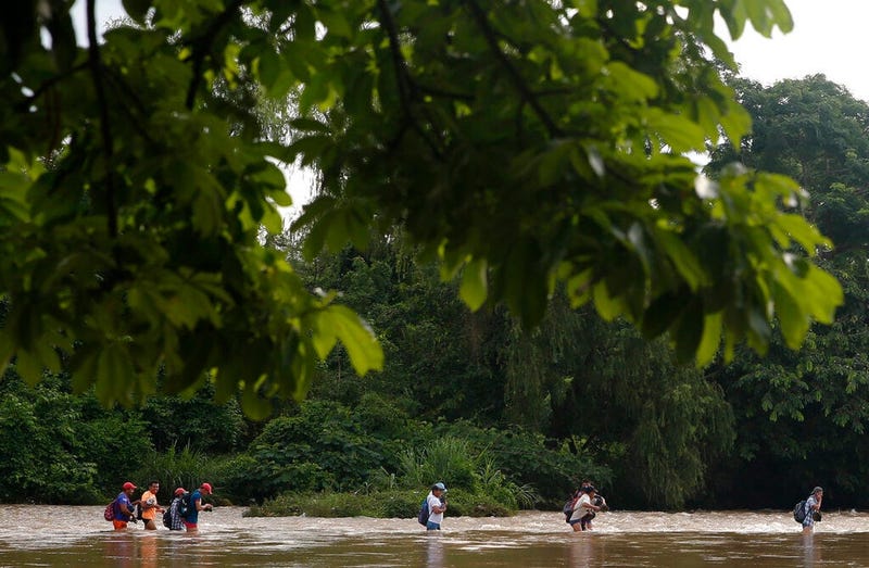 Guatemalan farm hands on their way to work in Mexican fields from Guatemala toward Frontera Hidalgo, Mexico, Thursday, June 13, 2019. The Suchiate cuts a winding north-south course en route to the Pacific Ocean, the westernmost part of Mexico’s expansive