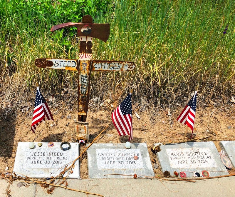 memorial stones at the Wildland Firefighters Monument at the National Interagency Fire Center in Boise, Idaho, for wildland firefighters killed by a wildfire on June 30, 2013, near Yarnell, Ariz.