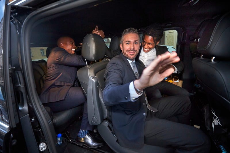 A$AP Rocky, background right, leaves the district court in Stockholm by car, after the third day of his trial, Friday, Aug. 2, 2019.