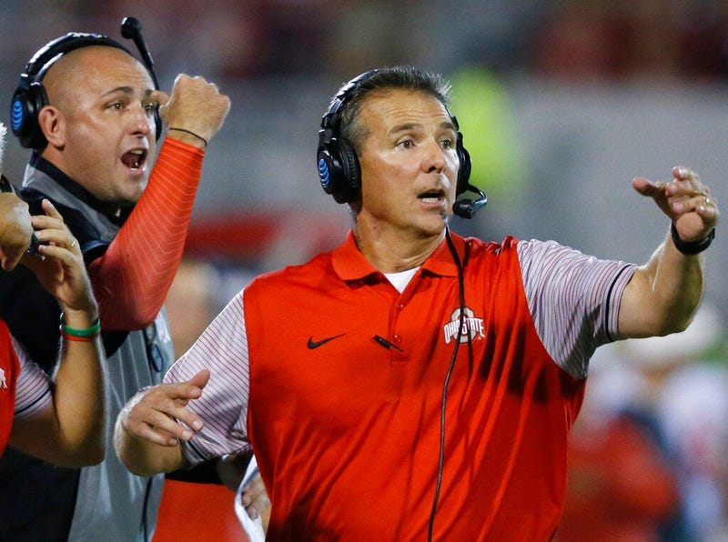 Ohio State coach Urban Meyer, right, and assistant coach Zach Smith, left