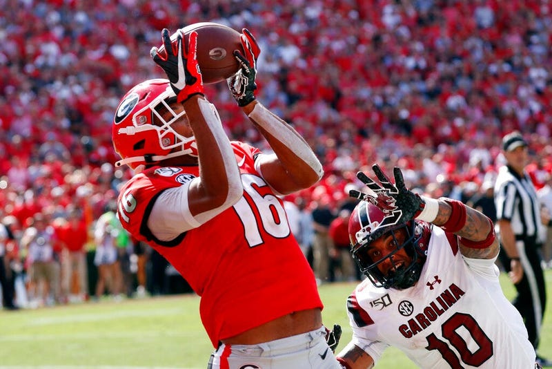 Georgia wide receiver Demetris Robertson (16) catches a pass for a touchdown as South Carolina defensive back R.J. Roderick (10) defends in the second half of an NCAA college football game Saturday, Oct. 12, 2019, in Athens, Ga.