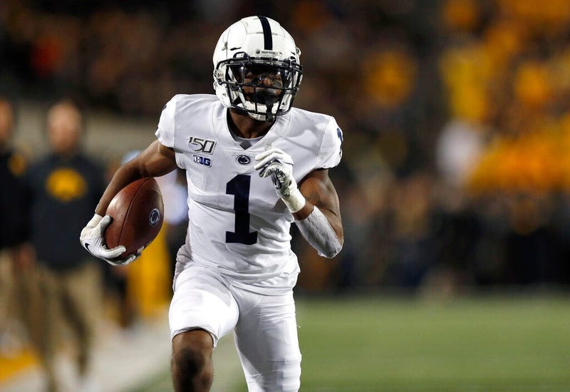 Penn State wide receiver KJ Hamler runs the ball in for a touchdown during the first half of the team's NCAA college football game against Iowa on Saturday, Oct. 12, 2019, in Iowa City, Iowa.