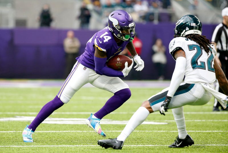Minnesota Vikings wide receiver Stefon Diggs, left, runs from Philadelphia Eagles cornerback Sidney Jones, right, after catching a pass during the first half.