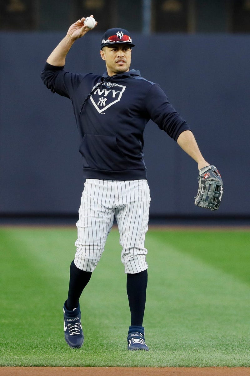 New York Yankees left fielder Giancarlo Stanton warms up during batting practice before Game 4 of baseball's American League Championship Series against the Houston Astros Thursday, Oct. 17, 2019, in New York.