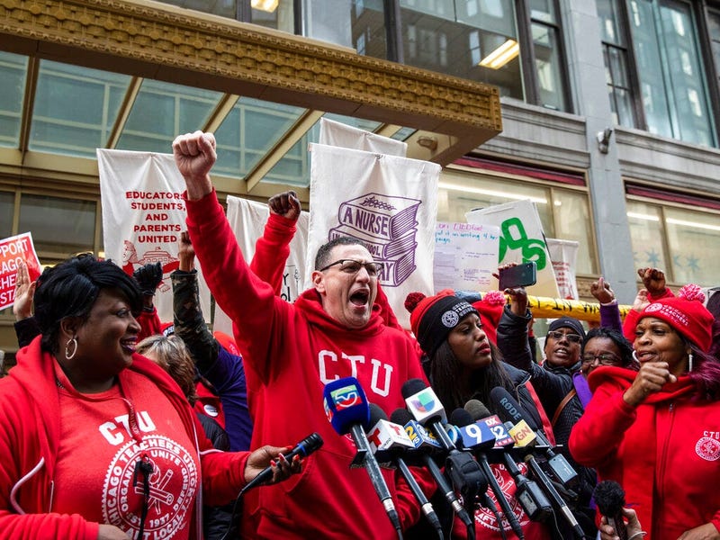 Chicago Teachers Union President Jesse Sharkey speaks during a rally outside Chicago Public Schools headquarters in the Loop, before marching through downtown with thousands of striking union members and their supporters, Thursday, Oct. 17, 2019