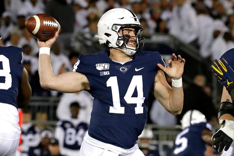 Penn State quarterback Sean Clifford throws a pass during the first half of the team's NCAA college football game against Michigan in State College, Pa., Saturday, Oct. 19, 2019.